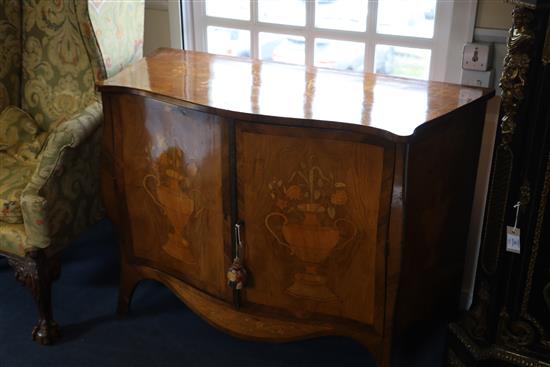 A late 19th century French marquetry inlaid serpentine commode, W.3ft 10in. D.1ft 8in. H.2ft 8.5in.